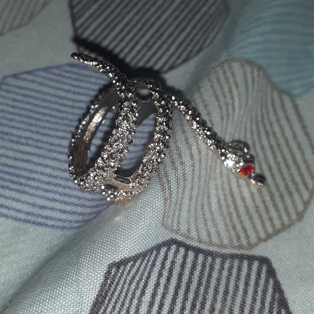 A beautiful NEVER WORN Snake Red eyed Golden Ring.